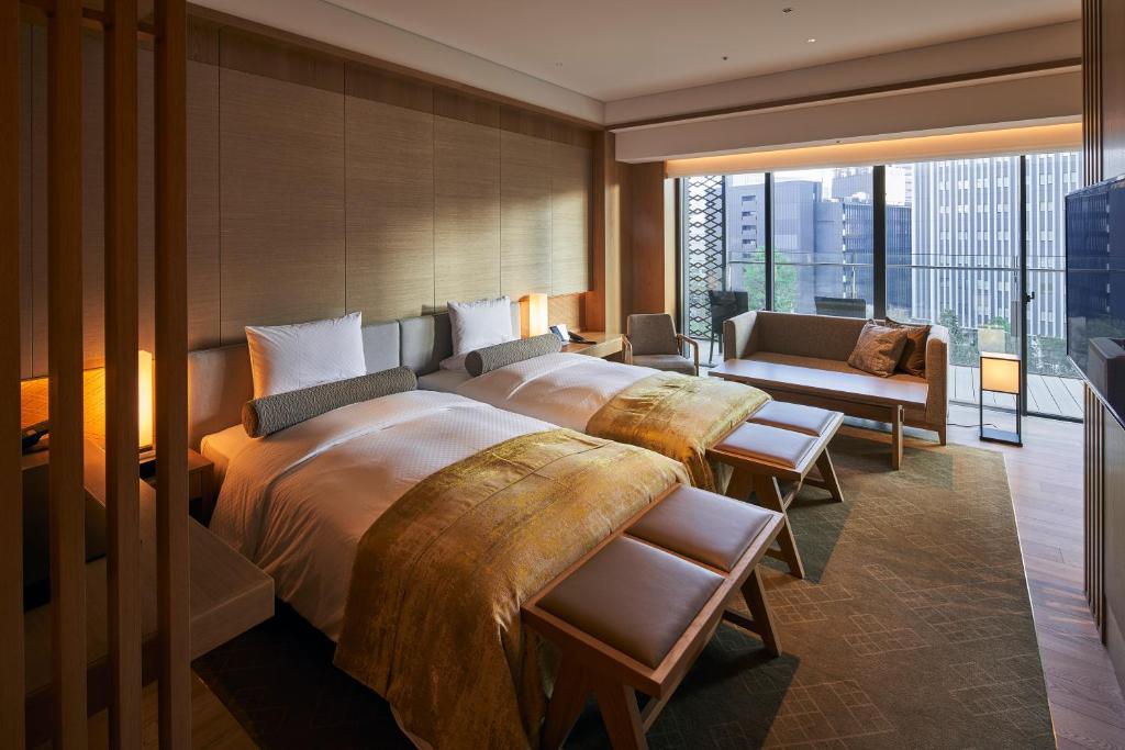 The reproduced main lobby of a Tokyo hotel, with hanging light fittings and low tables.